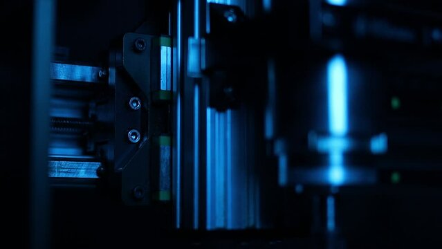 cnc router, spindle, stepper motors, close-up, dark background, blurred