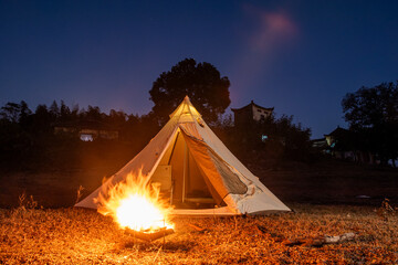 tent in the forest、camp fire in the forest