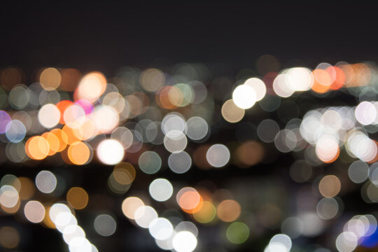 Beautiful Bokeh colorful background on the street in midnight Thailand