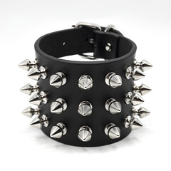 Black leather bracelet with spikes, pyramids. An accessory for rockers, bikers, metalheads, goths...