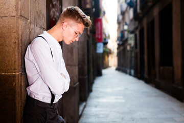 Man posing in gothic quarter of Barcelona