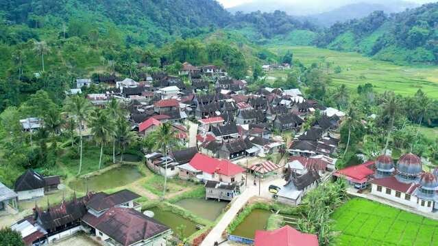 Establish aerial view of Kampung Sarugo Lima Puluh Kota, Revealing Surrounding Rumah Gadang, Landmark of West Sumatra, Indonesia