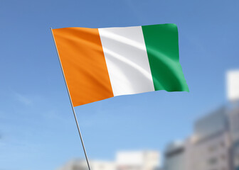 Ivory Coast flag waving in the wind.