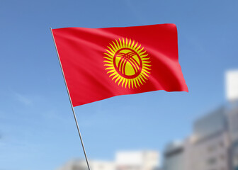 Kyrgyzstan flag waving in the wind.