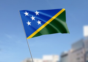Solomon Islands flag waving in the wind.
