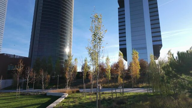 Madrid's financial district with its four skyscraper towers on a sunny day.