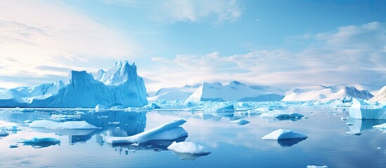Greenland's Ilulissat icefjord features vast icebergs from melting glaciers, showcasing the beauty of the Arctic.