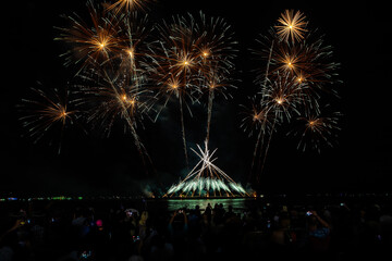 Colorful fireworks, beautiful like the stars in the sky, fireworks at the Pattaya beach, New Year's festival and tourism festival.