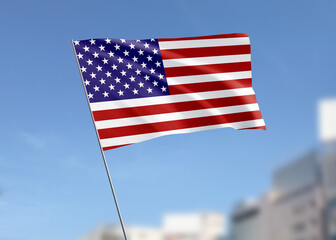 United States flag waving in the wind.