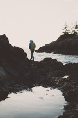 Man exploring coast of San Juan Island in Washington