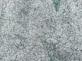 Old covering on a sports ground as an abstract background. Texture