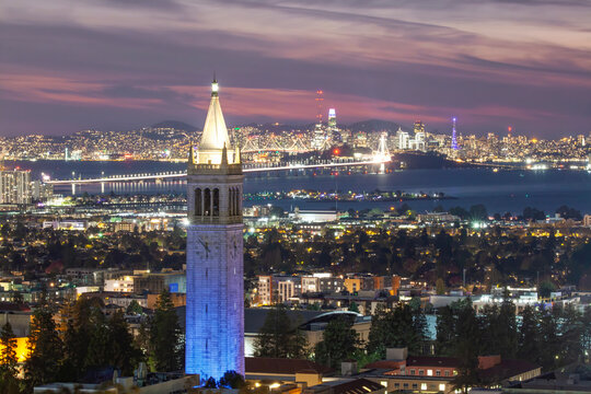 Sather Tower in UC Berkeley and San Francisco City Skyline at Sunset