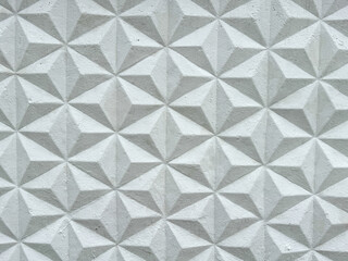 Patterned white concrete fence as background. Texture