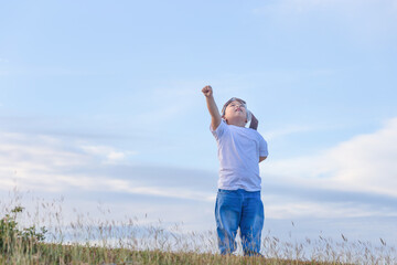 Little kid boy play superhero, Happy playful children playing outdoors, Child having fun outdoor