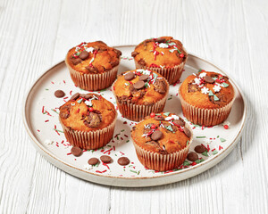 Сhristmas sweet potato muffins on plate, top view