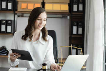 Lawyer woman working at desk in law office. Law, Lawyer businesswoman.