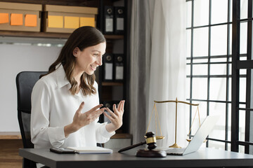 Lawyer woman working at desk in law office. Law, Lawyer businesswoman.