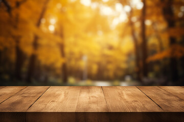 wooden table top empty, blur autumn yellow background - obrazy, fototapety, plakaty