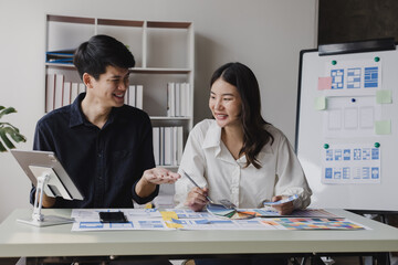 Business teamwork and working with UX developer and UI designer at table in modern office. Creative and development agency concept.