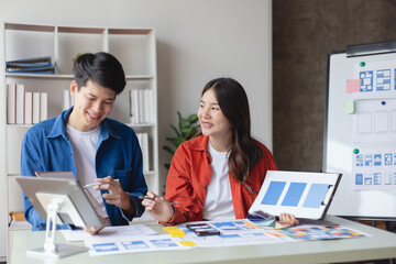 Business teamwork and working with UX developer and UI designer at table in modern office. Creative and development agency concept.