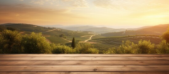 Sunrise over Tuscan vineyard, empty wooden table.