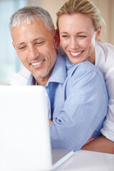 Mature couple, laptop and video call with hug, conversation and living room couch. Social media, technology and communication with family, man and woman with connection, streaming and happy