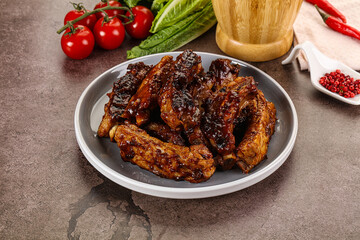 Grilled pork ribs in barbecue sauce