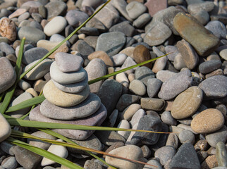 A stack of Zen stones, a close-up of pebbles stacked on top of each other, top view