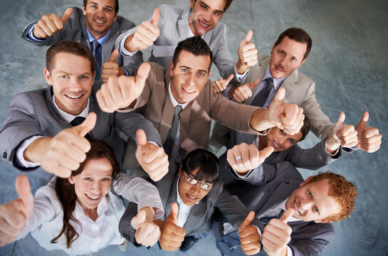 Portrait, group and happy business people thumbs up for motivation, corporate feedback or job well done . Emoji like icon, top view and professional team yes sign for voting opinion agreement