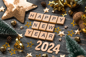 A postcard or banner. A symbol from the number 2024 with golden balls, stars, sequins and a beautiful bokeh on a wooden background. Happy New Year 2024. The concept of the celebration.