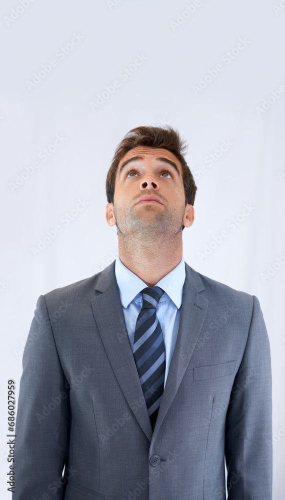 Poster Thinking, looking up and business man on a white background for options, decision and brainstorming ideas. Corporate, professional career and worker for problem solving, solution and choice in studio