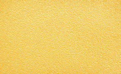 Golden wall rough Pebbles wall or golden or Yellow background