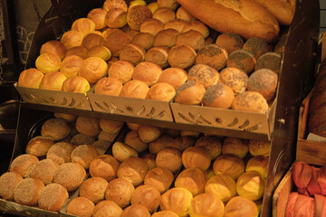 A variety of crusty and seeded breads presented. Highlights the importance of visual appeal in...