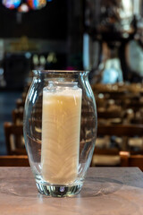 candles in a large glass jar
