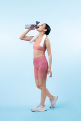 Athletic and sporty asian woman resting and drink water after intensive cardio workout training....