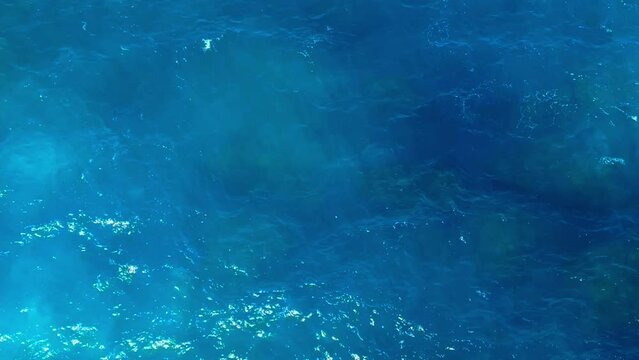 cinematic short Waves are coming in the water in the morning, the water is very shiny WATER