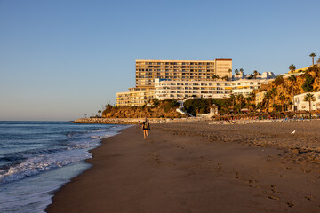 View of Bajondillo Beach and hotels in Torremolinos at sunrise. Costa del Sol, Spain. - obrazy, fototapety, plakaty