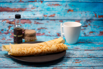 homemade pancakes on a black plate, tasty homemade breakfast