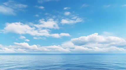 Blue sky panorama with puffy clouds above the sea The ocean is colored aqua. Sky with high resolution.