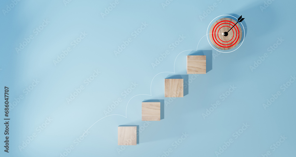 Wall mural woods block step on table with icon action plan, goal and target, success and business target concep