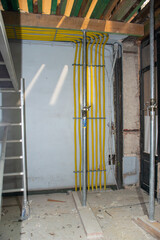 installation of pipes for the heat pump, pipes mounted on the wall