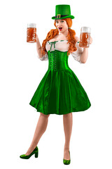 Happy Irish girl holding big mugs with beer or ale. Young red-haired woman аs green Leprechaun elf...