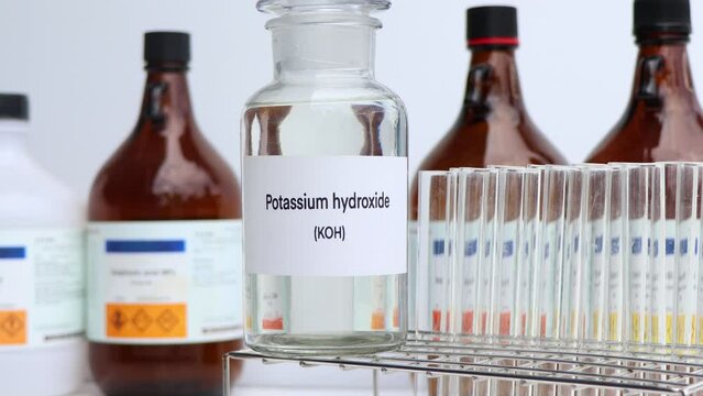 Potassium hydroxide in containers, Hazardous chemicals and raw material, chemical in industry or laboratory