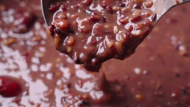 boiled red rice porridge with beans and jujubes. traditional food Laba porridge.