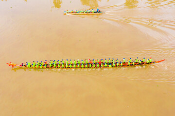 Boat racers are practicing rowing on the Maspero River. celebrate ok om bok festival