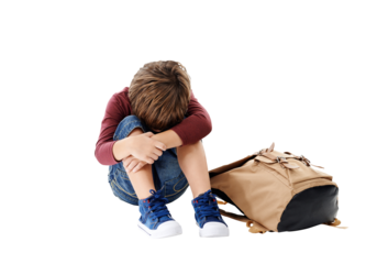 Sad boy, school bag and depression in anxiety, mental health or lonely isolated on a transparent PNG background. Little child or kid sitting on floor in stress, mistake or loneliness with backpack