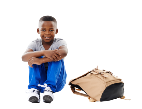 Happy, student and portrait of child with bag on isolated, png and transparent background. Back to school, education and young boy sitting on floor with backpack for learning, class and development