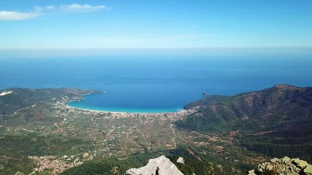 The sea and sea shore of the Thassos Island seen from high altitude on the Ypsarion or Ipsarion mountain in Thassos Island ,  Greece , south-eastern Europe , aerial drone footage.