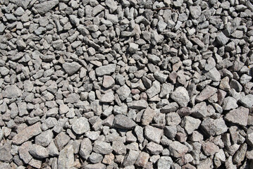texture of gray gravel stones on ground for the construction industry