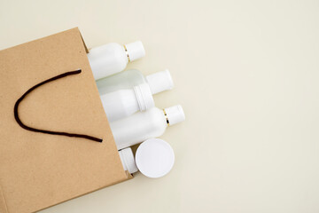 Skin care cosmetics in brown paper bag